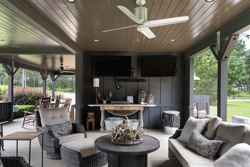 Wicker sofas and armchairs under the pavilion roof